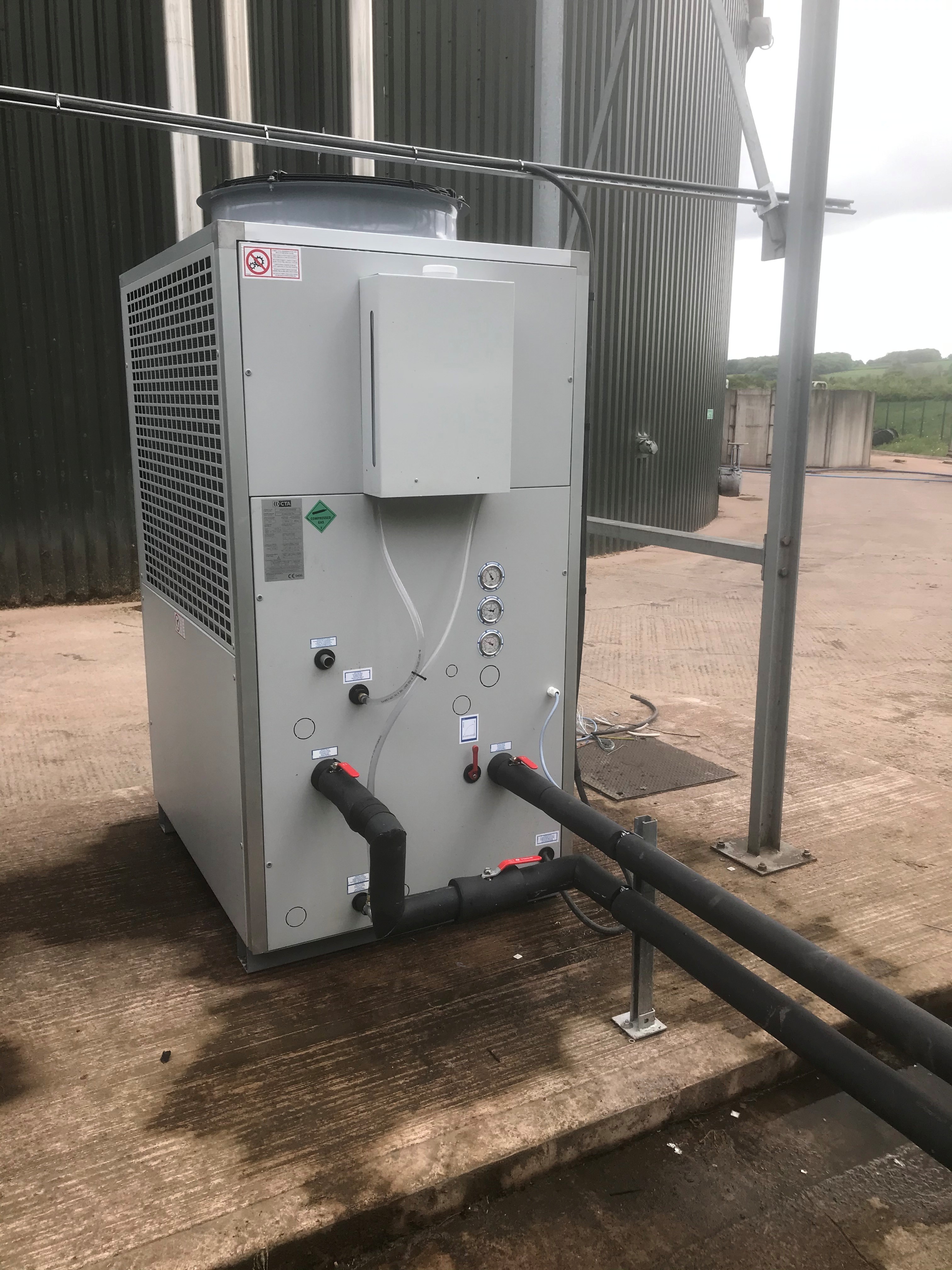 Refcool technician installing an in-stock chiller