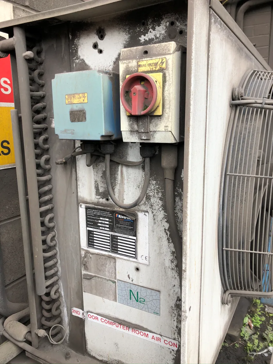 Aging chiller system in need of upgrade showing wear and outdated components